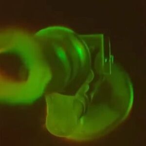 Vintage Hologram of a Microscope and its microorganisms